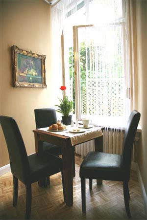 2 person 1 room apartment with king bed, private facilities, and breakfast